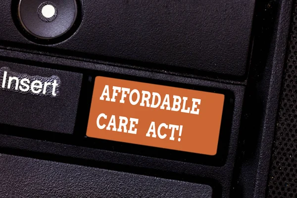 Writing note showing Affordable Care Act. Business photo showcasing Guarantees that can receive or buy health insurance Keyboard key Intention to create computer message pressing keypad idea. — Stock Photo, Image