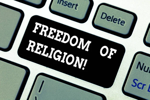 Writing note showing Freedom Of Religion. Business photo showcasing right to practise whatever religion one chooses Keyboard key Intention to create computer message pressing keypad idea.