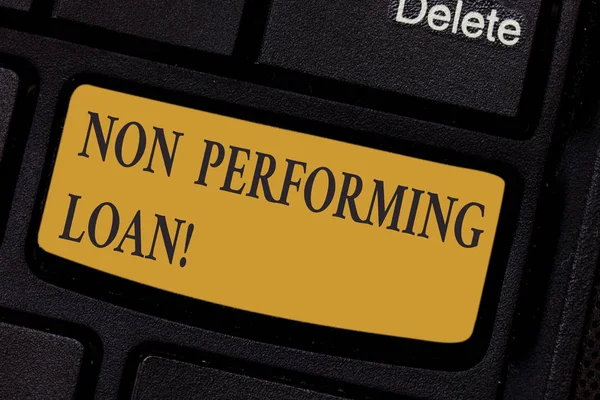 Writing note showing Non Performing Loan. Business photo showcasing in default stats within ninety days with no interest Keyboard key Intention to create computer message pressing keypad idea.