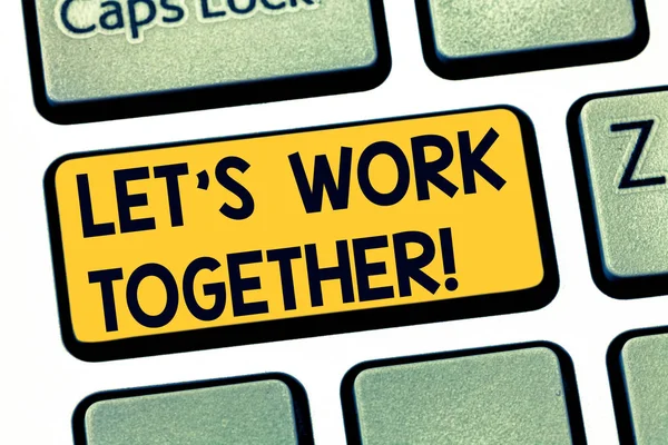 Text sign showing Let S Is Work Together. Conceptual photo Asking partners colleges to do work with you Keyboard key Intention to create computer message pressing keypad idea.