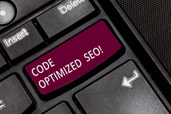 Writing note showing Code Optimized Seo. Business photo showcasing process of affecting visibility website in search engine Keyboard key Intention to create computer message pressing keypad idea.