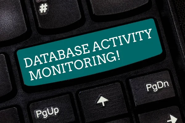 Writing note showing Database Activity Monitoring. Business photo showcasing the observation of actions in a database Keyboard key Intention to create computer message pressing keypad idea.