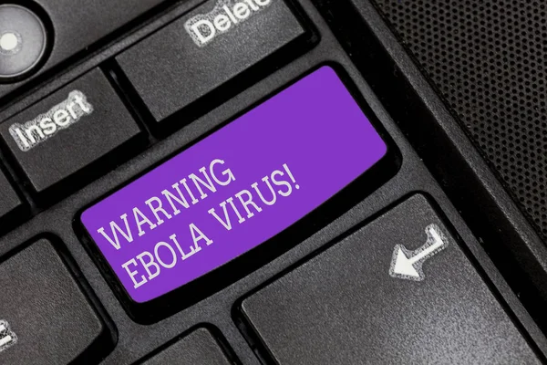 Κείμενο πινακίδα που δείχνει την προειδοποίηση ιού Έμπολα. Εννοιολογική φωτογραφία ενημερώσει δείχνοντας αποδεικνύοντας σχετικά με αυτό το κλειδί πληκτρολόγιο θανατηφόρα ασθένεια πρόθεση να δημιουργήσετε υπολογιστή μήνυμα πιέζοντας το αριθμητικό πληκτρολόγιο ιδέα. — Φωτογραφία Αρχείου