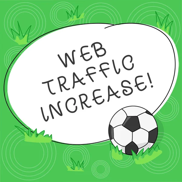 Writing note showing Web Traffic Increase. Business photo showcasing Growth of the amount of web users who visit a website Soccer Ball on the Grass and Blank Outlined Round Color Shape photo.