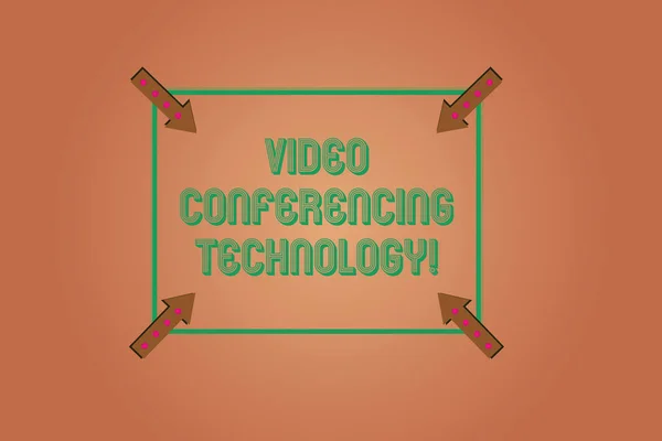 Handwriting text writing Video Conferencing Technology. Concept meaning People globally interacted through video data Square Outline with Corner Arrows Pointing Inwards on Color Background.