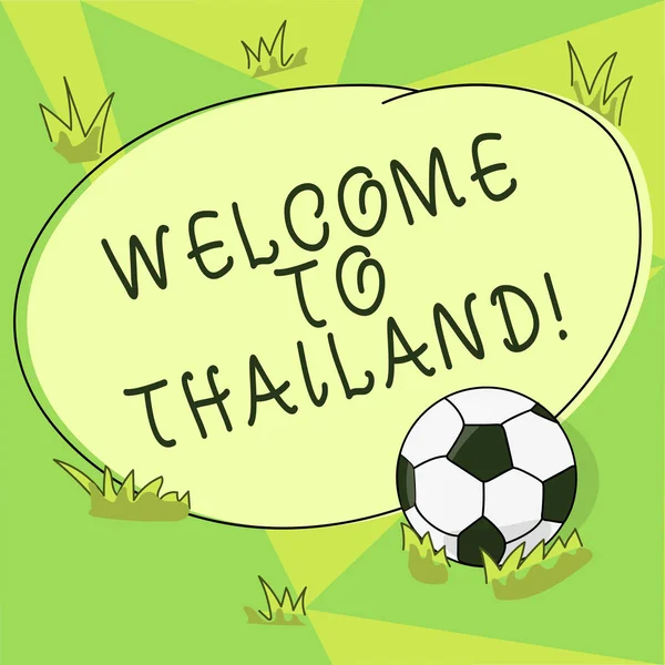 Conceptual hand writing showing Welcome To Thailand. Business photo showcasing inviting showing or tourist to visit your home country Soccer Ball on the Grass and Blank Round Color Shape photo.