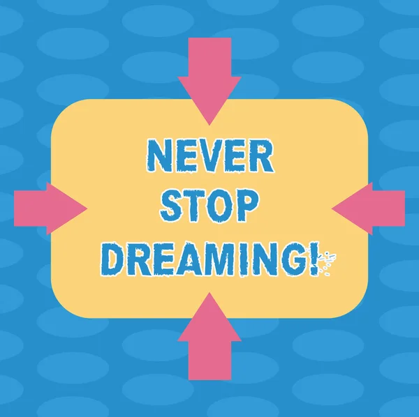 Word writing text Never Stop Dreaming. Business concept for dont waste your time in fantasy stick to achieve them Arrows on Four Sides of Blank Rectangular Shape Pointing Inward photo.