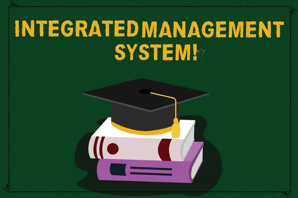 Text sign showing Integrated Management System. Conceptual photo combines all components of a business into one Color Graduation Hat with Tassel 3D Academic cap photo Resting on Books.