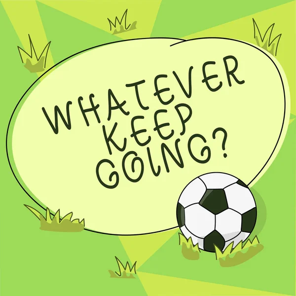 Conceptual hand writing showing Whatever Keep Going. Business photo showcasing continue doing something at difficult time or situation Soccer Ball on the Grass and Blank Round Color Shape photo.