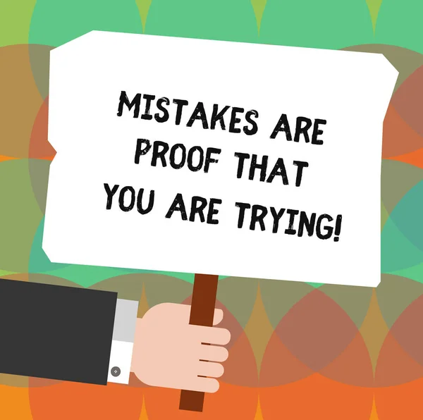 Conceptual hand writing showing Mistakes Are Proof That You Are Trying. Business photo showcasing Trial and error is the way to success Hu analysis Holding Colored Placard with Stick Text Space. — Stock Photo, Image