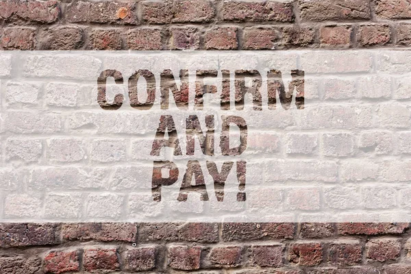 Word writing text Confirm And Pay. Business concept for Check out your purchases and make a payment Confirmation Brick Wall art like Graffiti motivational call written on the wall.