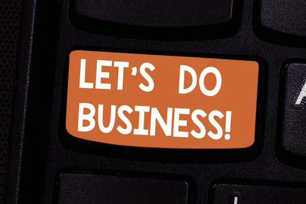 Conceptual hand writing showing Let S Do Business. Business photo showcasing one sells goods or services to others or countries Keyboard key Intention to create computer message idea.