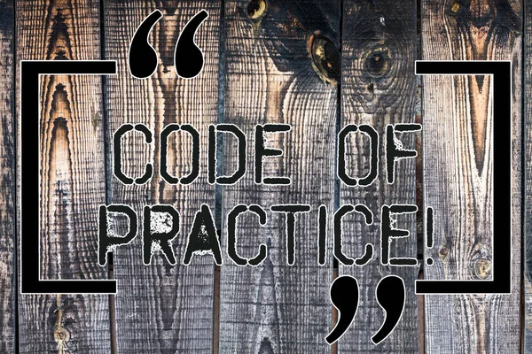 Handwriting text Code Of Practice. Concept meaning written rules explains how showing working particular job Wooden background vintage wood wild message ideas intentions thoughts.