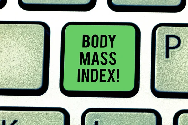 Handwriting text Body Mass Index. Concept meaning Value derived from the weight and height of an individual Keyboard key Intention to create computer message pressing keypad idea.
