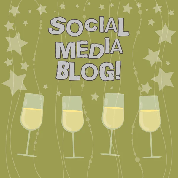 Text sign showing Social Media Blog. Conceptual photo Web page that serves publicly accessible demonstratingal journal Filled Cocktail Wine Glasses with Scattered Stars as Confetti Stemware.