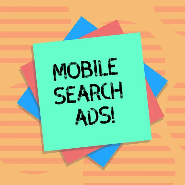 Word writing text Mobile Search Ads. Business concept for ad that can appear on webpages and apps viewed on phone Multiple Layer of Blank Sheets Color Paper Cardboard photo with Shadow.