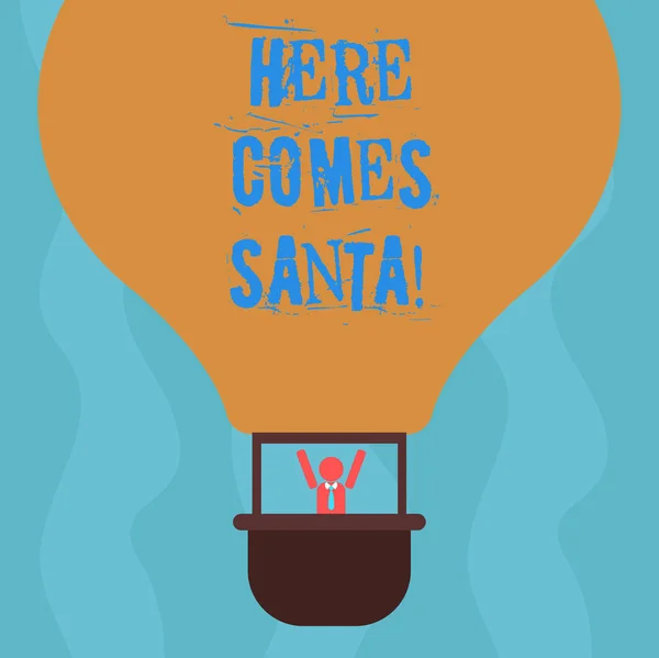 Scrittura concettuale a mano che mostra Here Comes Santa. Testo della foto aziendale Canzone natalizia scritta ed eseguita da Gene Autry Analisi Hu Dummy Arms Raising inside Gondola Riding Air Balloon . — Foto Stock