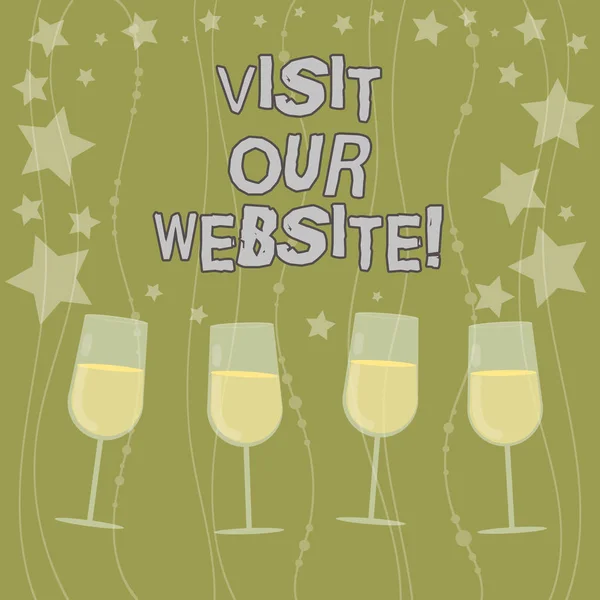 Text sign showing Visit Our Website. Conceptual photo go through site url in internet browser to see content Filled Cocktail Wine Glasses with Scattered Stars as Confetti Stemware.