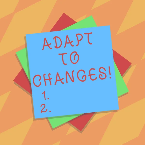 Text sign showing Adapt To Changes. Conceptual photo change your ideas or behaviour to deal with it successfully Multiple Layer of Blank Sheets Color Paper Cardboard photo with Shadow.