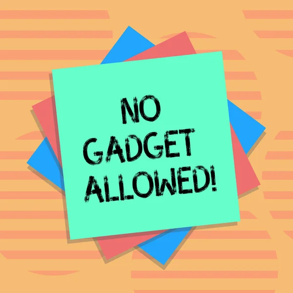 Word writing text No Gadget Allowed. Business concept for do not enter small mechanical or electronic device or tool Multiple Layer of Blank Sheets Color Paper Cardboard photo with Shadow.