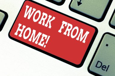 El yazısı metin Work From Home yazmaya. Kavram anlamı serbest iş senin ev uygun teknoloji klavye tuşuna basarak tuş takımı fikir bilgisayar ileti oluşturmak için niyet üzerinde çalışma.