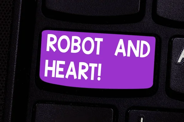 Writing note showing Robot And Heart. Business photo showcasing Sensitivity and care behind the machine technology Keyboard key Intention to create computer message pressing keypad idea.