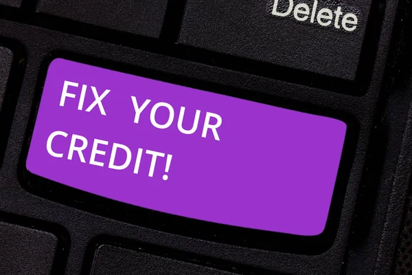 Text sign showing Fix Your Credit. Conceptual photo Keep balances low on credit cards and other credit Keyboard key Intention to create computer message pressing keypad idea. — Stock Photo, Image