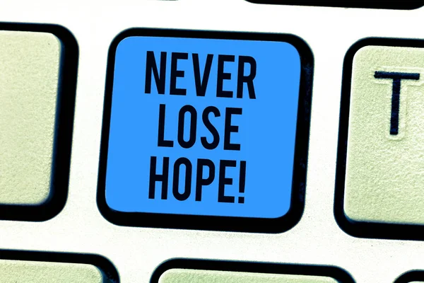 Conceptual hand writing showing Never Lose Hope. Business photo text Be positive optimistic have motivation to keep going Keyboard key Intention to create computer message idea.