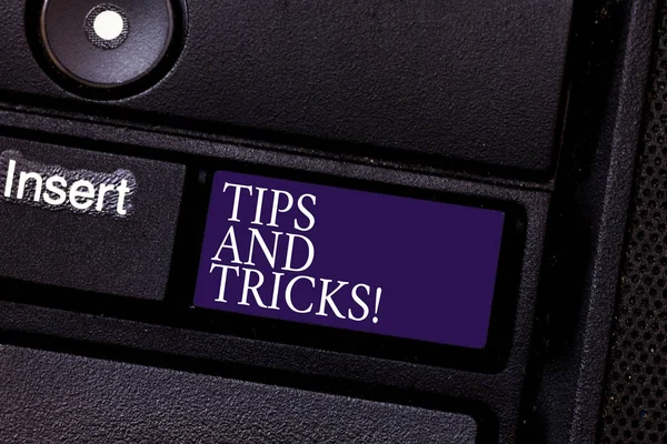 Word writing text Tips And Tricks. Business concept for Steps Life hacks Handy advice Recommendations Skills Keyboard key Intention to create computer message pressing keypad idea.