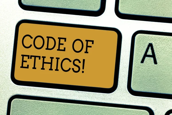 Conceptual hand writing showing Code Of Ethics. Business photo text Moral Rules Ethical Integrity Honesty Good procedure Keyboard key Intention to create computer message idea. — Stock Photo, Image
