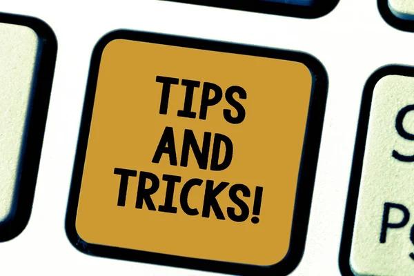 Word writing text Tips And Tricks. Business concept for Steps Life hacks Handy advice Recommendations Skills Keyboard key Intention to create computer message pressing keypad idea.
