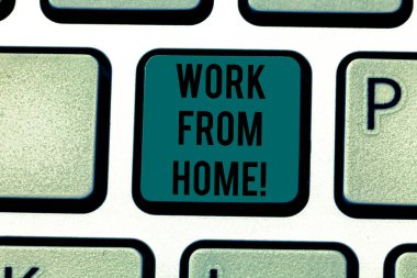 Kavramsal el Work From Home gösterilen yazma. İş fotoğraf metin serbest iş senin ev uygun teknoloji klavye anahtar bilgisayar ileti fikir oluşturmak için niyeti üzerinde çalışma.