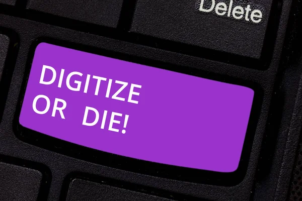 Text sign showing Digitize Or Die. Conceptual photo Embrace the digital evolution or get beaten by competition Keyboard key Intention to create computer message pressing keypad idea.