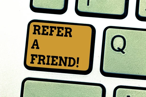 Text sign showing Refer A Friend. Conceptual photo Recommendation Appoint someone qualified for the task Keyboard key Intention to create computer message pressing keypad idea. — Stock Photo, Image