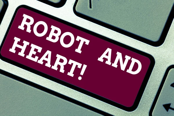 Writing note showing Robot And Heart. Business photo showcasing Sensitivity and care behind the machine technology Keyboard key Intention to create computer message pressing keypad idea.