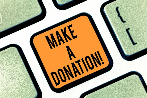 Text sign showing Make A Donation. Conceptual photo Donate giving things not used any more to needed showing Keyboard key Intention to create computer message pressing keypad idea.