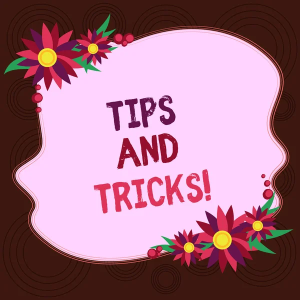 Writing note showing Tips And Tricks. Business photo showcasing Steps Life hacks Handy advice Recommendations Skills Blank Uneven Color Shape with Flowers Border for Cards Invitation Ads.