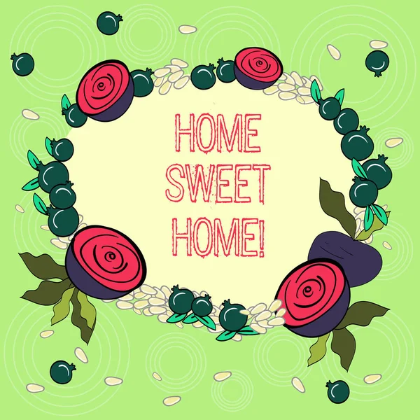 Textschild, das nach Hause Sweet Home zeigt. konzeptionelles Foto im Haus endlich wohl fühlen entspannte Familienzeit Blumenkranz aus winzigen Samen kleinen glänzenden Granatapfel und geschnittenen Rüben. — Stockfoto