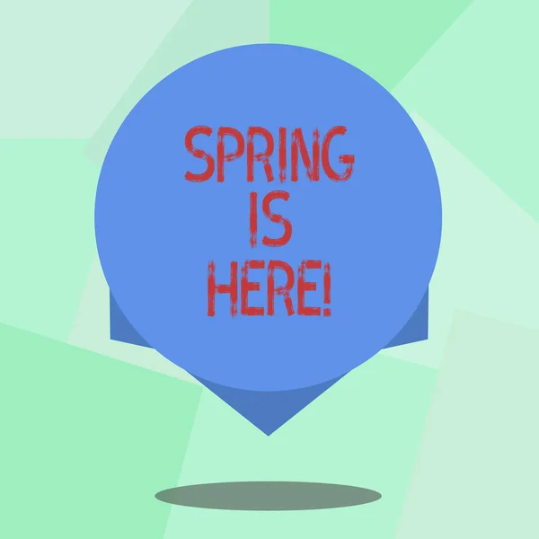 Conceptual hand writing showing Spring Is Here. Business photo showcasing After winter season has arrived Enjoy nature flowers sun Blank Color Circle with Shadow and Design at the Edge. — Stock Photo, Image