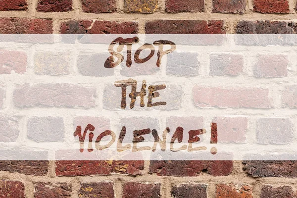 Writing note showing Stop The Violence. Business photo showcasing program empowers youth with attitudes skills and resources Brick Wall art like Graffiti motivational call written on the wall.