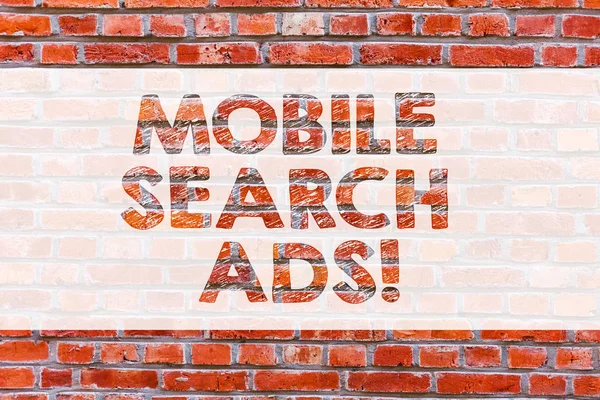 Conceptual hand writing showing Mobile Search Ads. Business photo showcasing ad that can appear on webpages and apps viewed on phone Brick Wall art like Graffiti motivational written on wall.