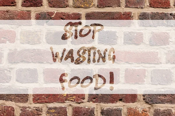 Írásbeli Megjegyzés megáll pazarlás élelmiszer mutatja. Üzleti fénykép bemutató szervezet működik élelmiszer-hulladék csökkentése társadalomban téglafal művészet, mint a Graffiti motivációs hívás a falra írt. — Stock Fotó