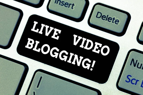 Writing note showing Live Video Blogging. Business photo showcasing form of web television on internet made by bloggers Keyboard key Intention to create computer message pressing keypad idea.