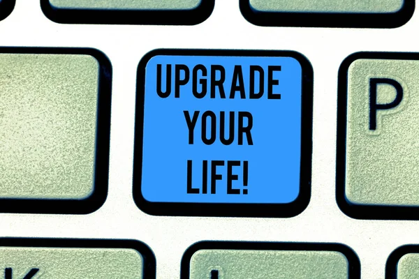 Writing note showing Upgrade Your Life. Business photo showcasing improve your way of living Getting wealthier and happier Keyboard key Intention to create computer message pressing keypad idea.