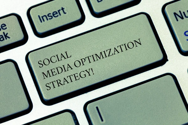 Writing note showing Social Media Optimization Strategy. Business photo showcasing SEO Advertising Marketing strategies Keyboard key Intention to create computer message pressing keypad idea.