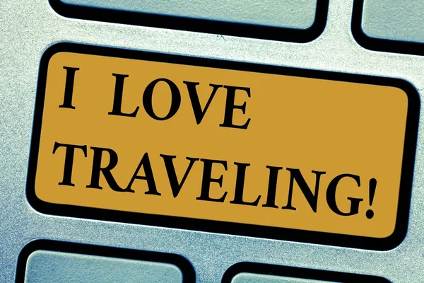 Writing note showing I Love Traveling. Business photo showcasing admire make journey typically of some length with vehicle Keyboard key Intention to create computer message pressing keypad idea. — Stock Photo, Image