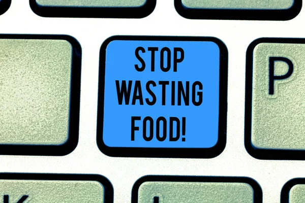 Writing note showing Stop Wasting Food. Business photo showcasing organization works for reduction food waste in society Keyboard key Intention to create computer message pressing keypad idea.