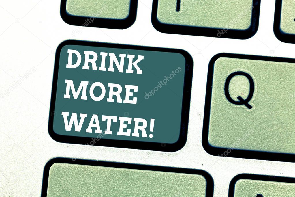 Writing note showing Drink More Water. Business photo showcasing increase amount of drinking water required varies everyday Keyboard key Intention to create computer message pressing keypad idea.