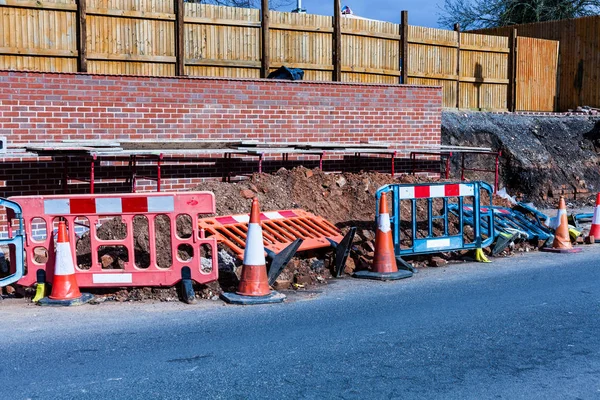 Construction site on the street. Security and traffic concept on the street. Repairing works on the street. — Stock Photo, Image