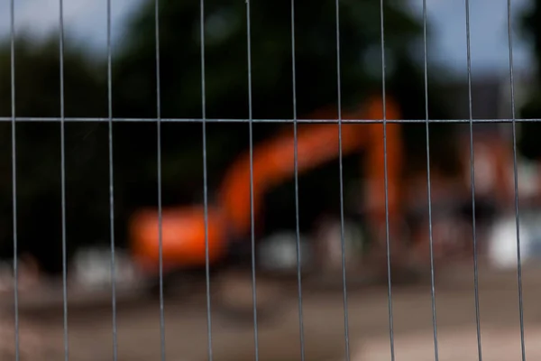 Wire fence with dark blurred background. Security concept with wired fence. — Stock Photo, Image